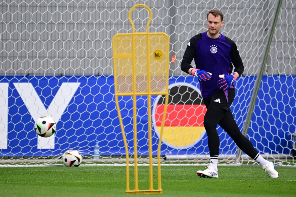 Germany's goalkeeper #01 Manuel Neuer attends a MD-1 training session at the team's base camp in Herzogenaurach, on June 28, 2024, on the eve of their Euro 2024 Round of 16 football match against Denmark. (Photo by AFP)