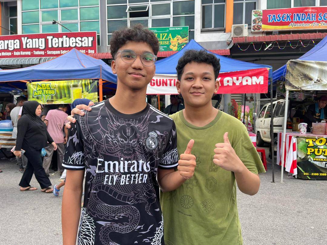 Rifqi Mizal Ahmad Fakhrul Amin (R) and Raneshdev Devandran