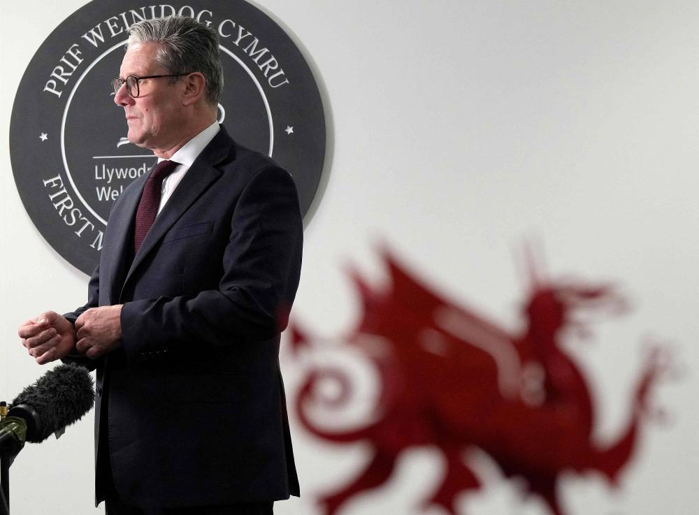 Britain's Prime Minister Keir Starmer reacts during an interview whilst visiting the the Senedd, the seat of the Welsh Assembly, in Cardiff, south Wales, on July 8, 2024, as part of his two-day tour of the four nations of the United Kingdom. (Photo by AFP)