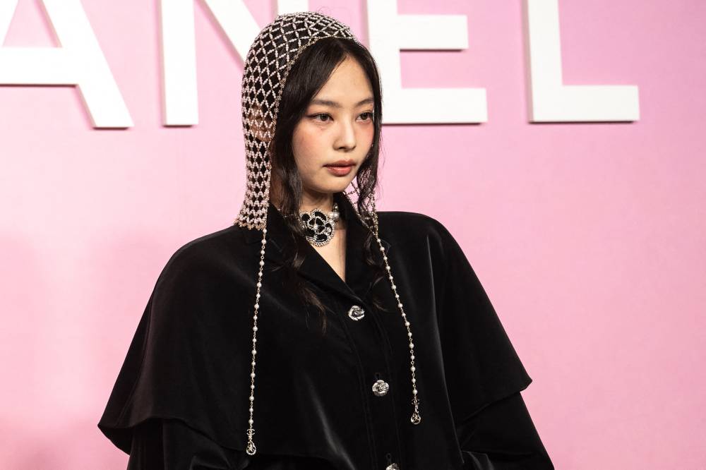 South Korean K-pop group Blackpink member Jennie Kim takes part in a photo shoot during the 2022/23 Métiers d'art Chanel – Dakar Show in Tokyo on June 1, 2023. - (Photo by PHILIP FONG / AFP)