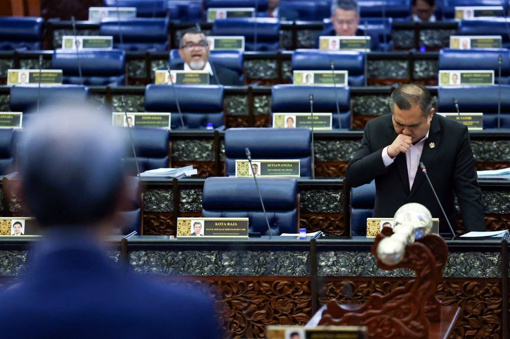 The Dewan Rakyat session turned anxious for a moment when Transport Minister Anthony Loke looked like he was out of breath and cleared his throat several times, before the Deputy Speaker asked for his duties to be taken over by Hasbi. - Photo by Bernama
