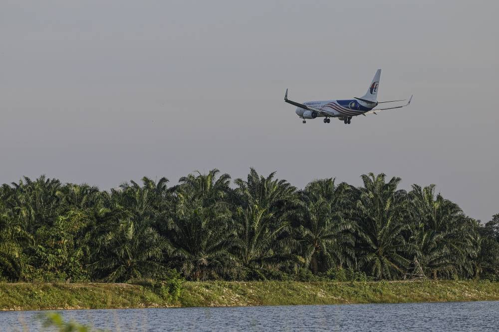 Nur Shazana was one of the 15 crew members on MH17, which was shot down by a missile over a conflict zone in eastern Ukraine, killing all 298 people on board, including 80 children. - Photo by Bernama