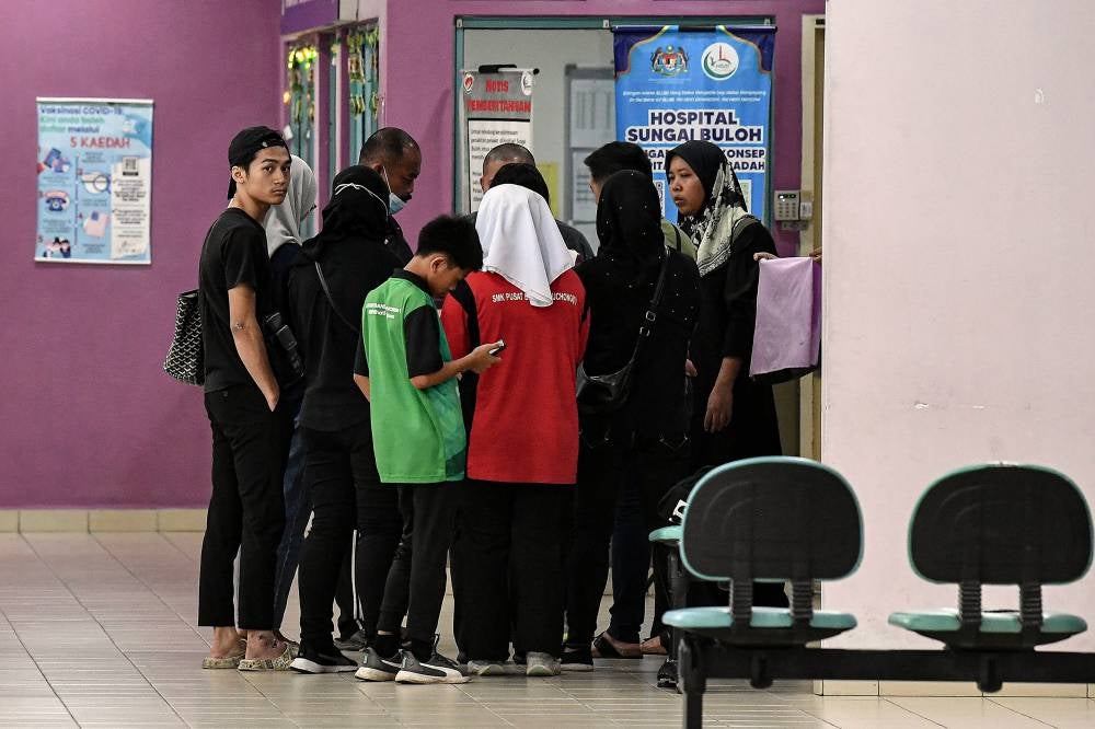 Mohd Fariza Amir, 28, Nur Farah Kartini’s brother, informed the media that the exact location of his youngest sister's funeral will be announced later. - Photo by Bernama