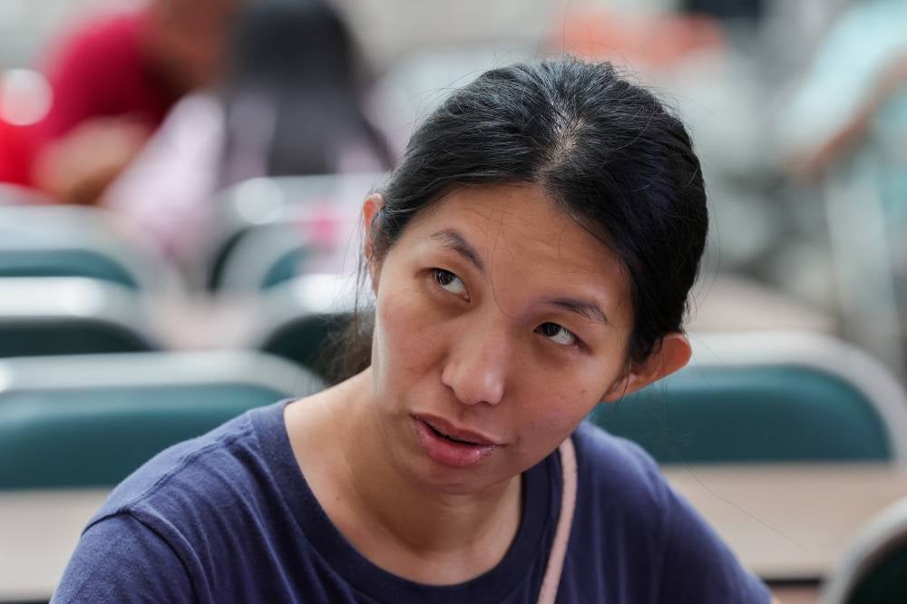 Leo Qieo Xin, 37, who has been at the shopping mall since the incident, said she was very worried about the safety of her third child of four siblings and said she would remain at the location of the disappearance until her daughter is found. Photo by Bernama