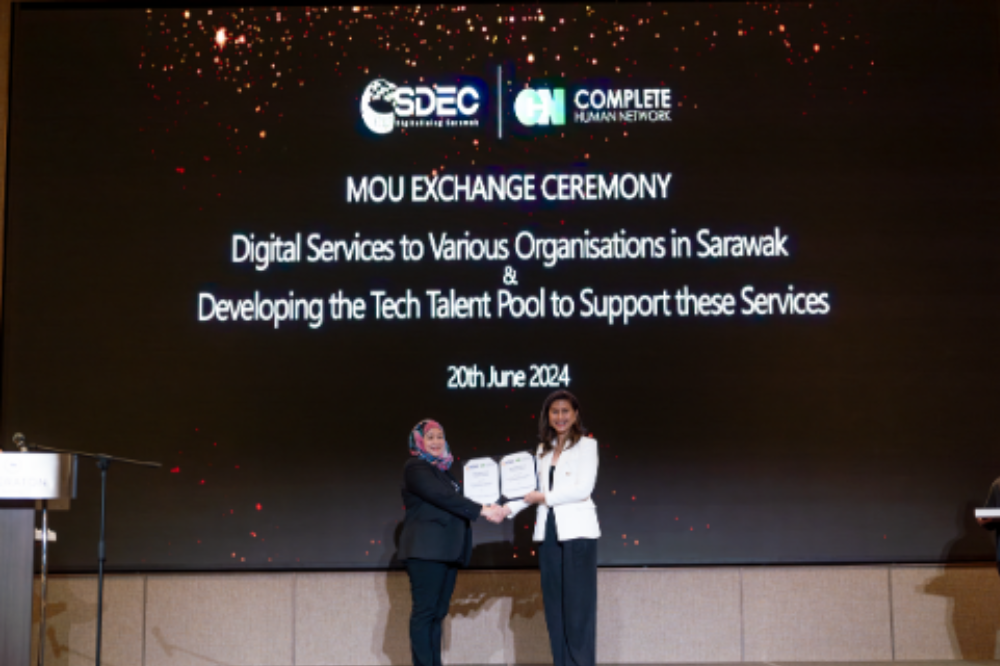 Complete Human Network (CHN) founder and CEO Teh Chai Peng (right) at the MOU signing ceremony.