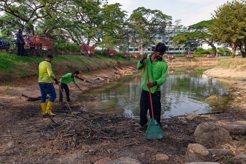 Visuals of several parts of the 133-year-old Lake Gardens drying up have gone viral. - Photo by Bernama