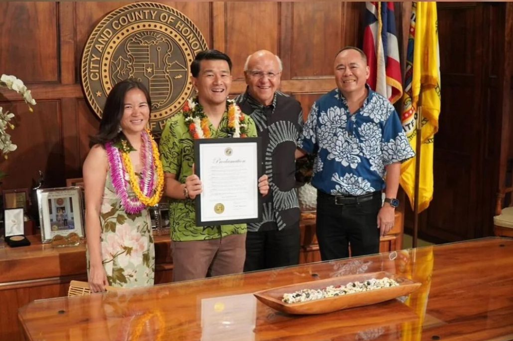 (from left) Hannah Pham (Chieng's wife), Chieng and Oahu Mayor Rick Blangiardi. Photo: Instagram