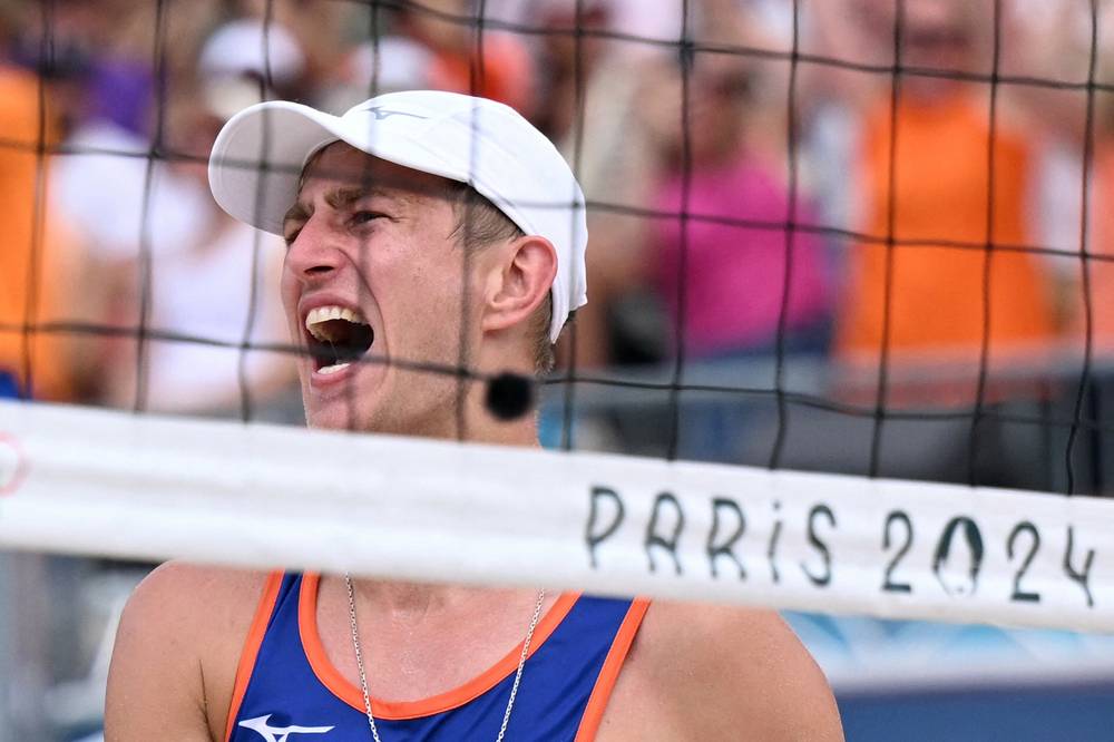 Dutch beach volleyball player Steven van de Velde, who was convicted of raping a 12-year-old girl a decade ago, has sparked widespread outrage and debate as he competes at the Paris Olympics. (Photo by Kirill KUDRYAVTSEV / AFP)