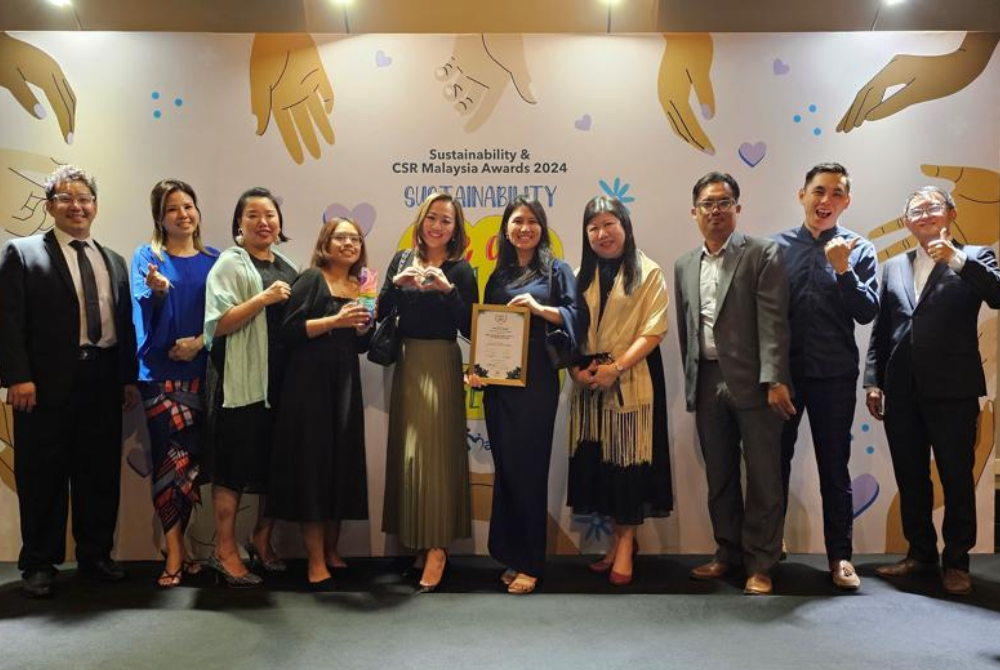 The team from Touch ‘n Go Group with the Company of the Year (Fintech) award for “Best in Neuro-Inclusivity in the Workplace” at the Sustainability & CSR Malaysia Awards 2024.