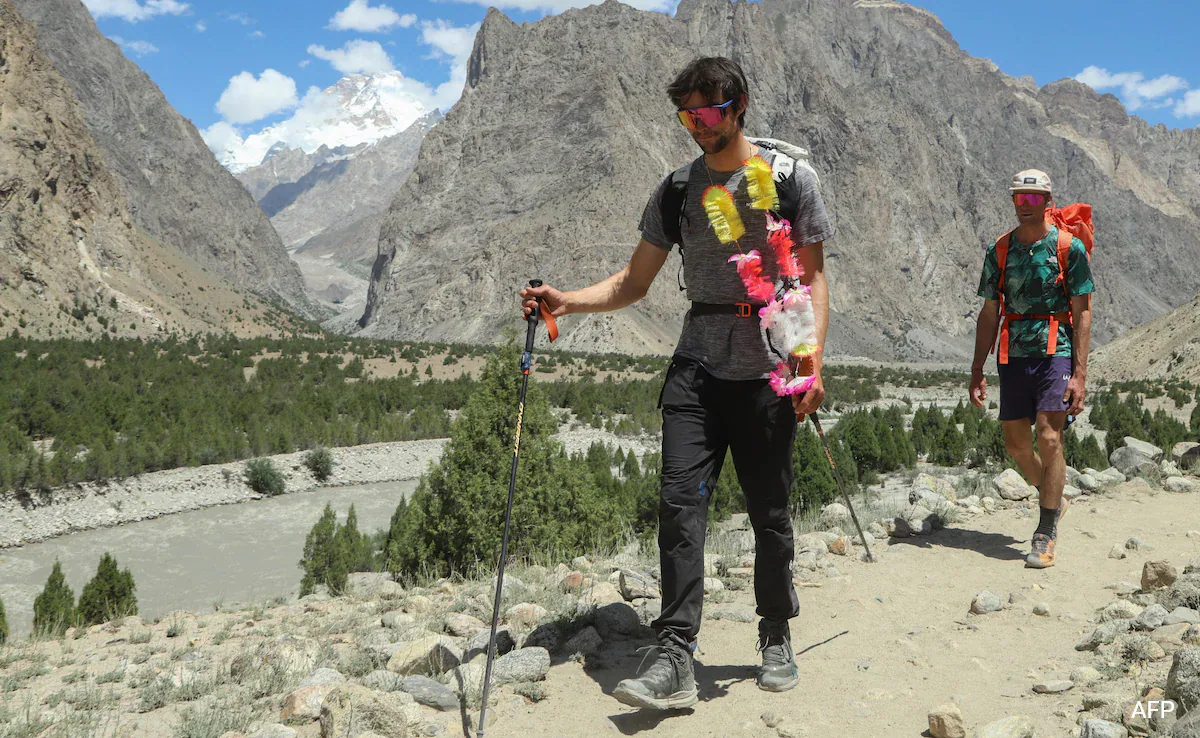 Vedrines scaled the world's second-highest mountain -- standing at 8,611 metres (28,251 feet) on the border of Pakistan and China -- in 10 hours, 59 minutes and 59 seconds on July 28.