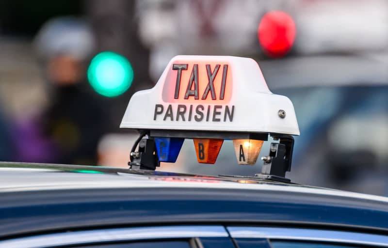 French police have reportedly started a fraud investigation against a Paris taxi driver who has bee accused of charging an Olympic official from Qatar €1,499 ($1,639) instead of the €14 shown on the meter. - (Photo by Robert Michael / DPA)