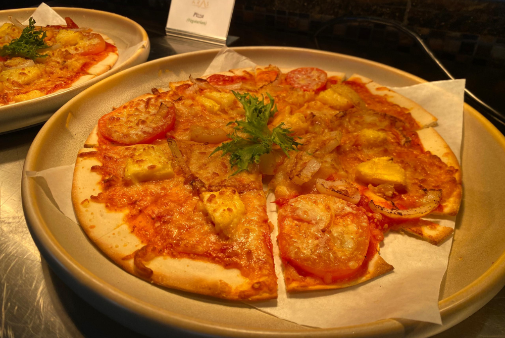 Pizza is also available in the buffet spread. 