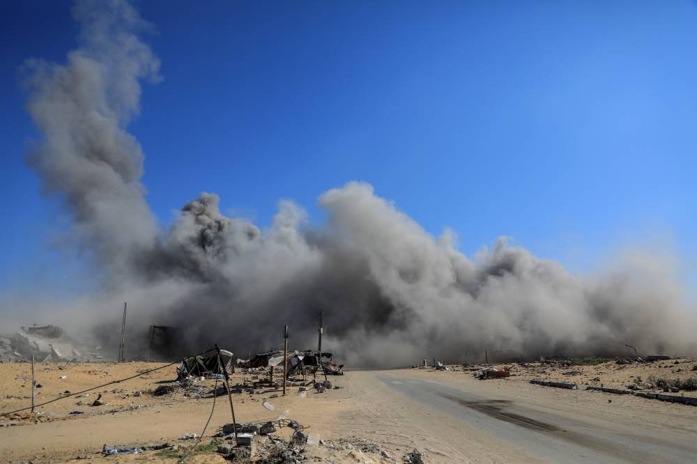 Smoke rises from the vicinity of the Hamad Towers area northwest of the southern Gaza Strip city of Khan Younis, on Aug. 16, 2024. - Photo by XINHUA