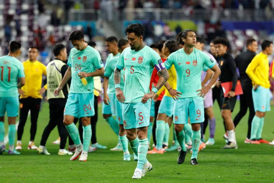 China's defender Zhang Linpeng and forward Zhang Yuning react after the Qatar 2023 AFC Asian Cup Group A football match between Qatar and China on January 22, 2024. - File photo by AFP
