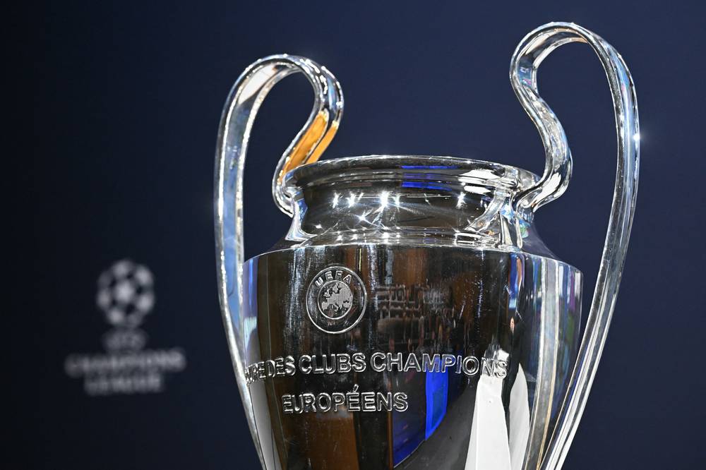 Starting with the 2024-25 season, UCL's traditional group stage will be replaced by the new ‘Swiss Model’ format. (Photo by Fabrice COFFRINI / AFP)