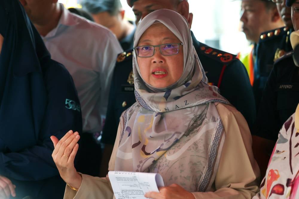 Minister in the Prime Minister's Department (Federal Territories) Dr Zaliha Mustafa during a press conference at the scene where an Indian national fell into a sinkhole on Jalan Masjid India. - Photo by Bernama