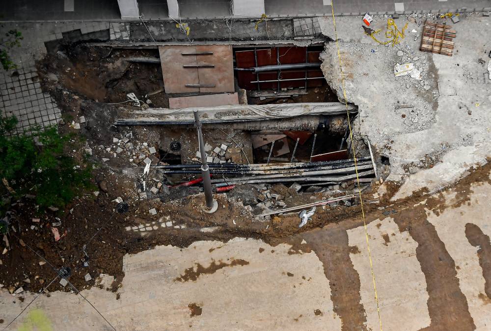 The condition of the sinkhole site on Jalan Masjid India, Kuala Lumpur on Sept 1. - Photo by Bernama