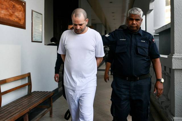 Israeli Avitan Shalom was charged with two counts of trafficking six firearms and possessing 200 rounds of ammunition at the Kuala Lumpur Sessions Court. - BERNAMA FILE PIX