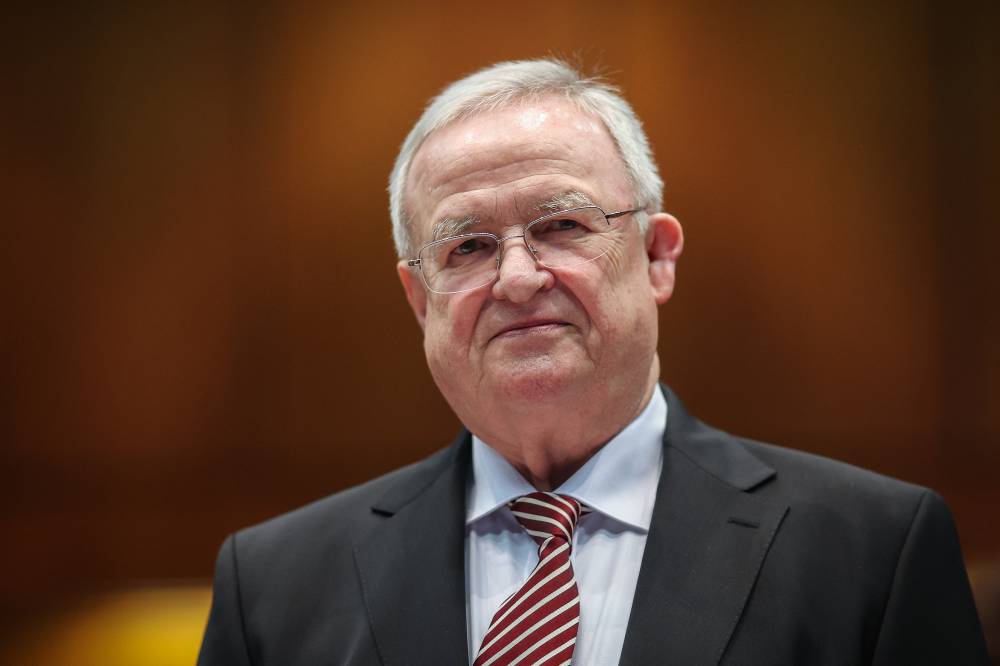 Former CEO of German carmaker Volkswagen (VW) Martin Winterkorn waits for the start of a resumed trial for market manipulation, on Feb 14, 2024 in Braunschweig, northern Germany. - (Photo by Ronny Hartmann / AFP)