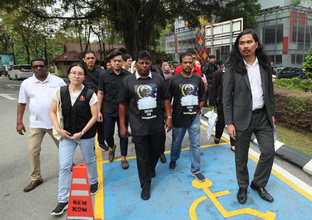 Lawyer Zaid Malek representing the family of the late RMN cadet officer J. Soosaimanicckam, along with family members and several NGOs, submitted a memorandum of protest to the IGP at Bukit Aman on Aug 8, over failure to open a homicide investigation into the cadet's death. - BERNAMA FILE PIX