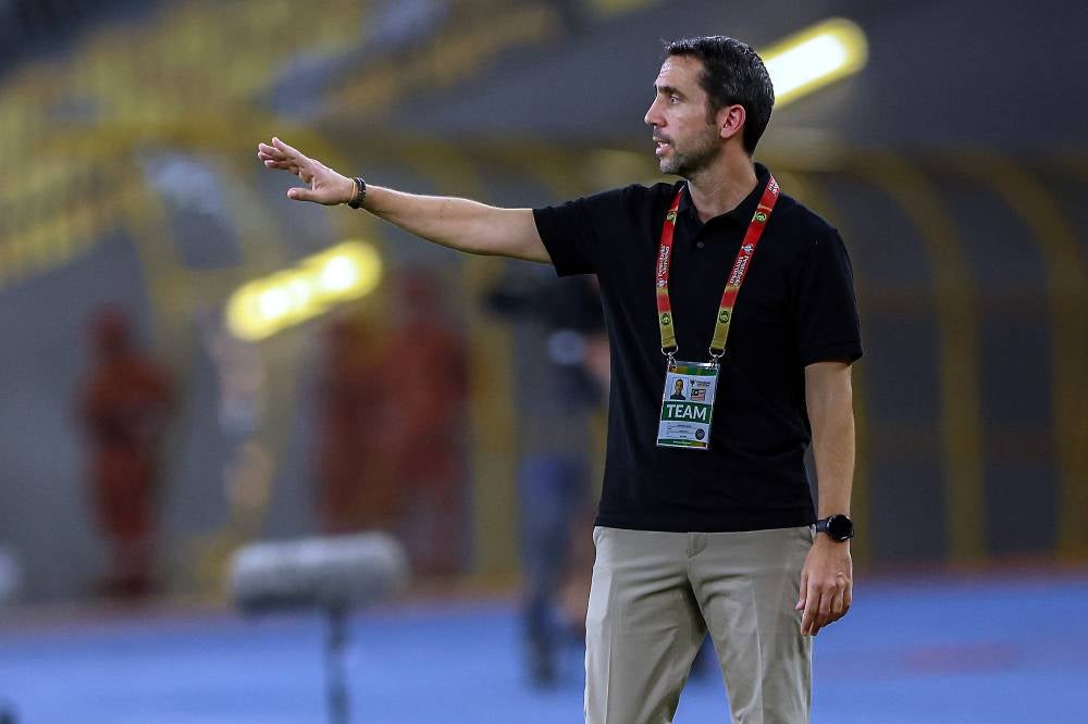National head coach Pau Marti Vicente gestures during yesterday's match. - Photo by Bernama