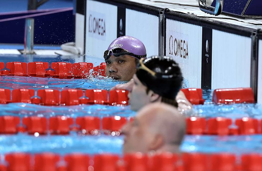 Nur Syaiful concluded his Paris 2024 Paralympic campaign by finishing seventh in the men's 50m freestyle S5 (physical impairment) final, recording a time of 34.34 seconds at the Paris La Defense Arena. - Photo by Bernama