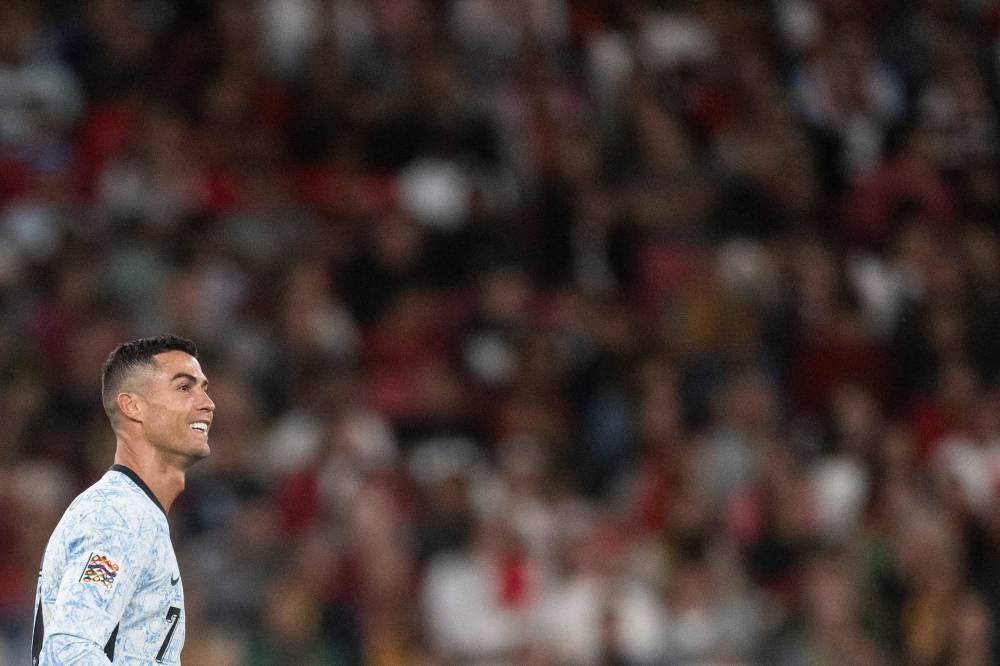 Portugal's forward #07 Cristiano Ronaldo looks on during the UEFA Nations League group A football match between Portugal and Croatia at the Luz stadium in Lisbon on September 5, 2024. (Photo by AFP)