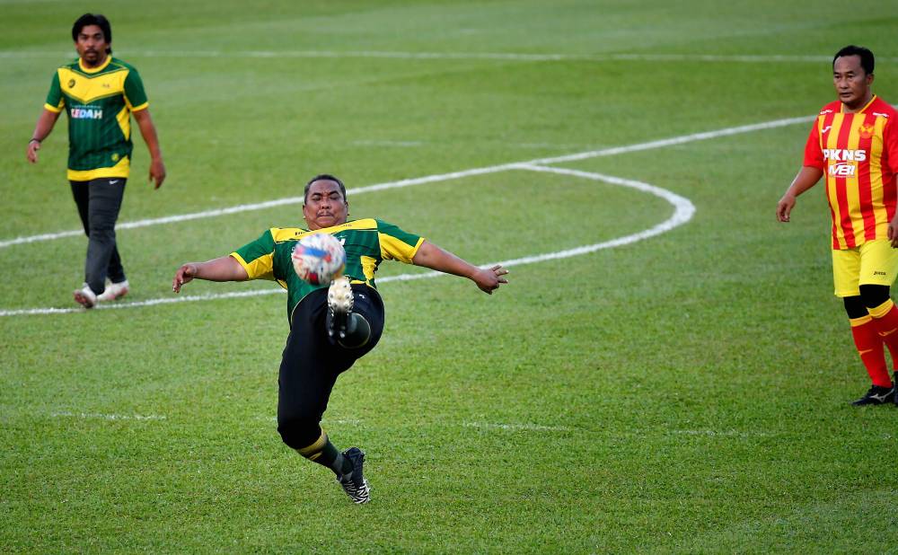 Sanusi during a friendly football match with Selangor MB select team recently. - File photo by Bernama