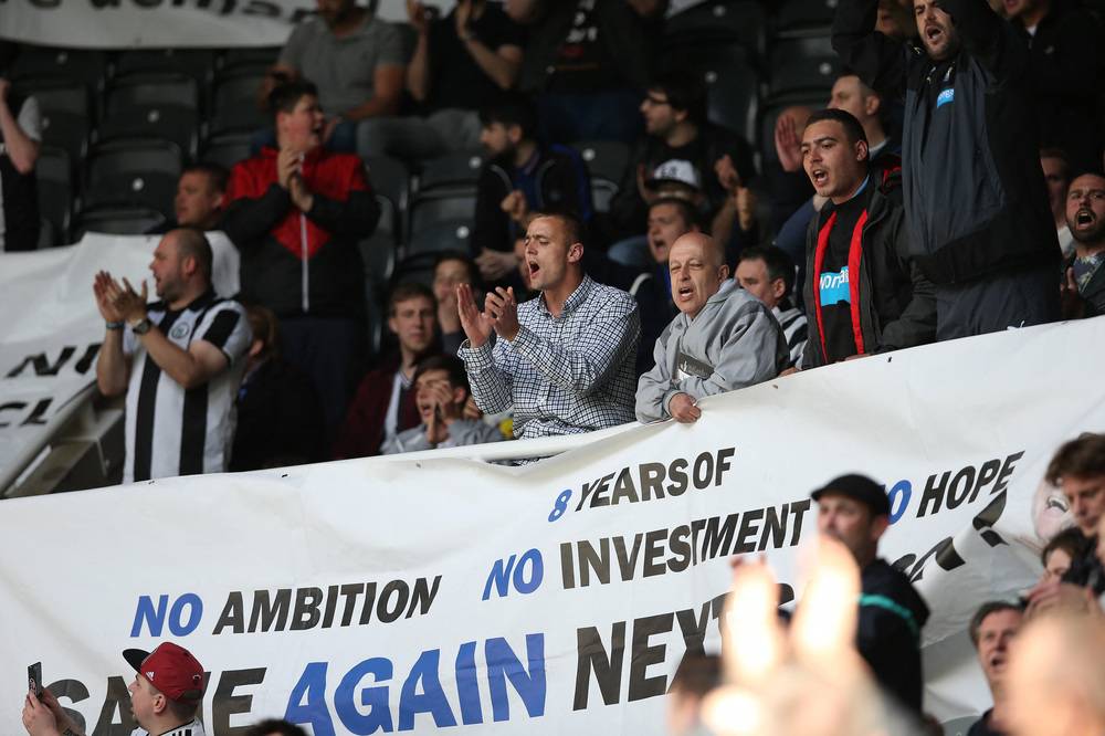 Fans protest against former Newcastle owner Mike Ashley after the English Premier League football match between Newcastle United and West Ham United at St James Park, Newcastle-Upon-Tyne, north east England on May 24, 2015. - Photo by AFP