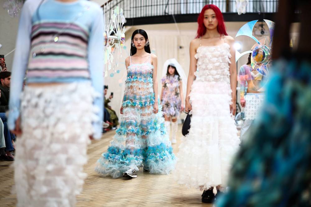 For illustrative purposes -
A model presents a creation by London-based designer Susan Fang during the Autumn/Winter 2024 collection catwalk presentation during London Fashion Week in London on Feb 19, 2024. (Photo by HENRY NICHOLLS / AFP)