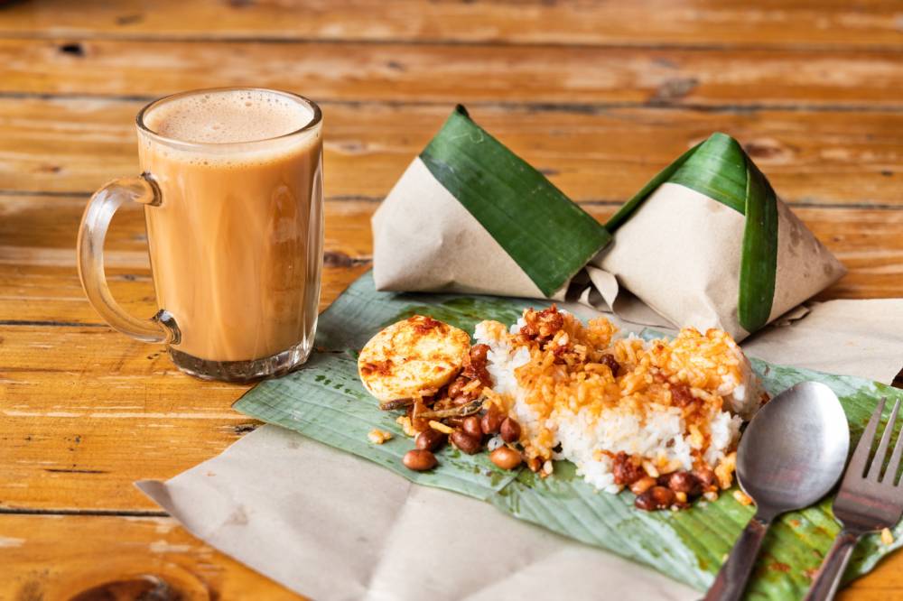 In a recent survey by Kajidata Sdn Bhd on what Malaysians have for breakfast, their love for Nasi Lemak and Teh Tarik/Teh O reigns supreme. Photo for illustrative purposes only. 