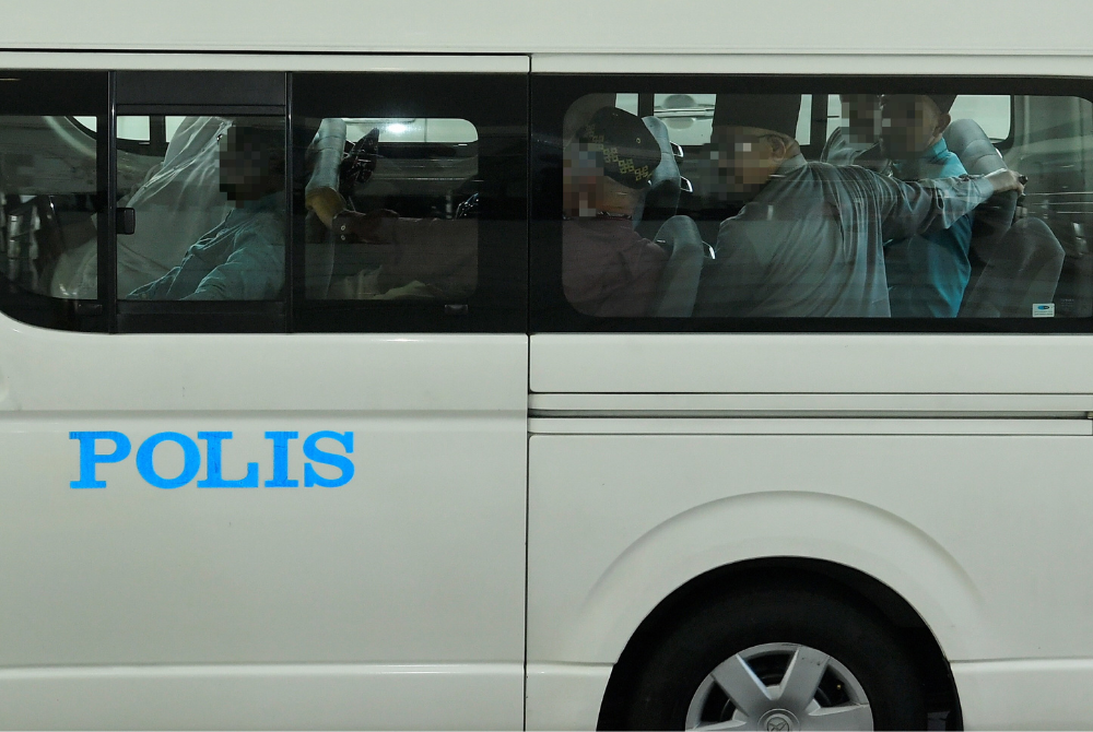 Top management personnel were among 19 individuals arrested by the Bukit Aman Criminal Investigation Department’s (CID) D8 (Special Operations), D14 (Organised Crime) and the Special Integrated Investigation Team, in simultaneous raids at four residential units in Bukit Bintang. - Photo by Bernama