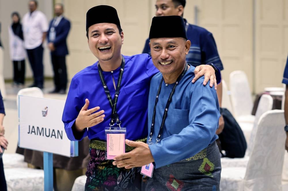 Barisan Nasional candidate Syed Hussien (left) and Perikatan Nasional Haizan. - Photo by Bernama