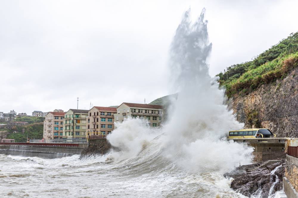 Huge waves are seen near the waters of Jinshatan in Shitang Town, Wenling City of east China's Zhejiang Province, Sept. 19, 2024. - Photo by Xinhua