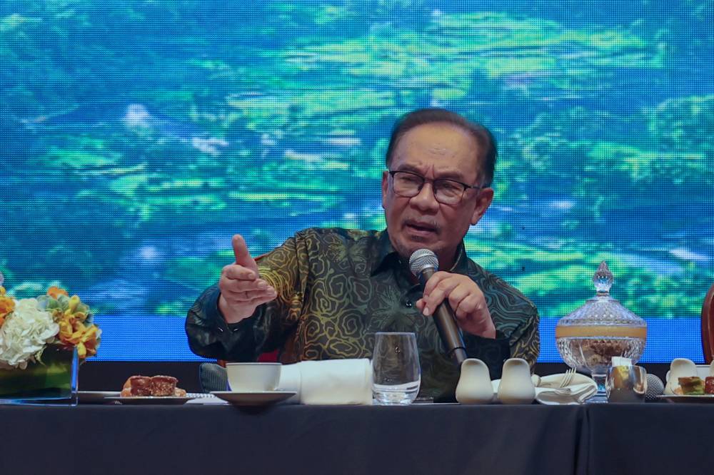 Anwar said he had to be stern about the matter to ensure such practices are not repeated. - Photo by Bernama