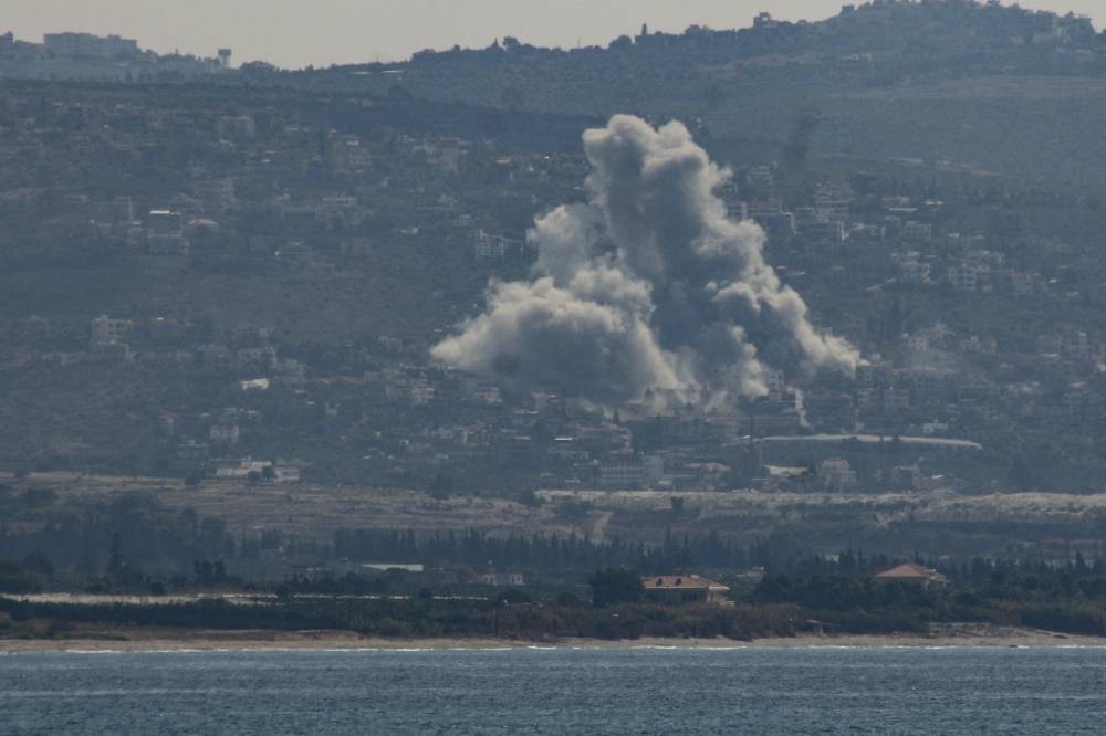 Smoke billows from the site of an Israeli strike that targeted the village of Mansouri in southern Lebanon's Tyre district on Sept 28, 2024. - (Photo by KAWNAT HAJU / AFP)
