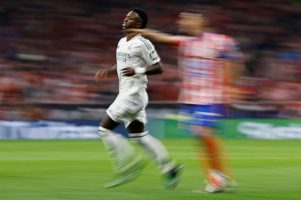 Real Madrid's Brazilian forward Vinicius Junior is pictured during the Spanish league football match between Club Atletico de Madrid and Real Madrid CF at the Metropolitano stadium in Madrid on September 29, 2024. (Photo by AFP)