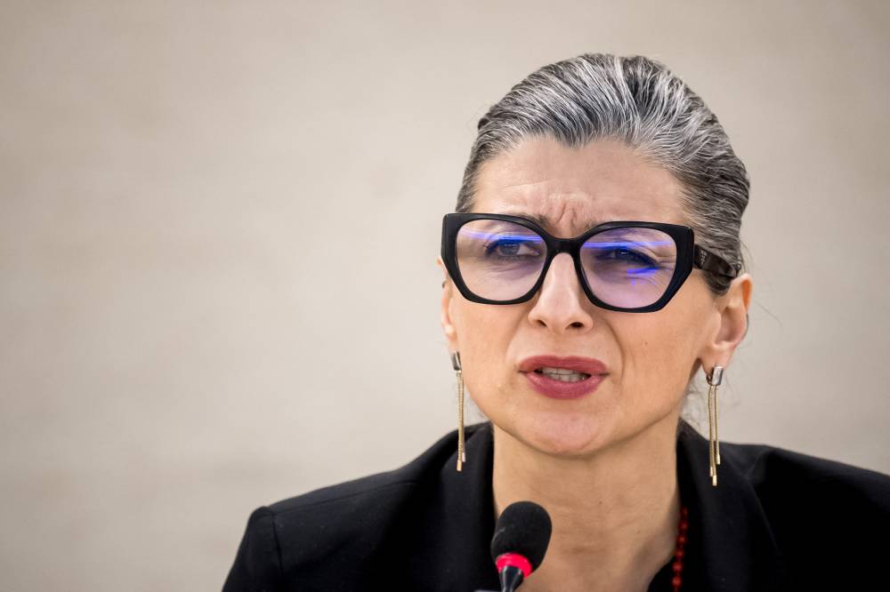 UN Special Rapporteur on the Rights Situation in the Palestinian Territories, Francesca Albanese, delivers her rapport during a session of the UN Human Rights Council, in Geneva, on March 26, 2024. - (Photo by FABRICE COFFRINI / AFP)