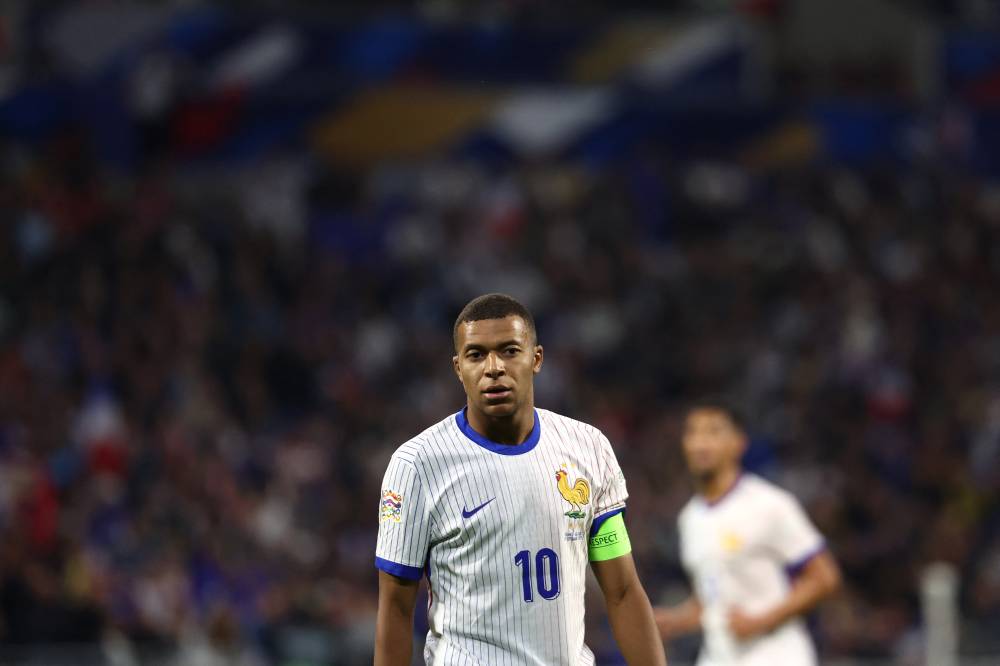 France's forward #10 Kylian Mbappe looks on during the UEFA Nations League, League A - Group 2 first leg football match between France and Belgium at the Parc Olympique Lyonnais in Lyon on Sept 9, 2024. (Photo by FRANCK FIFE / AFP)