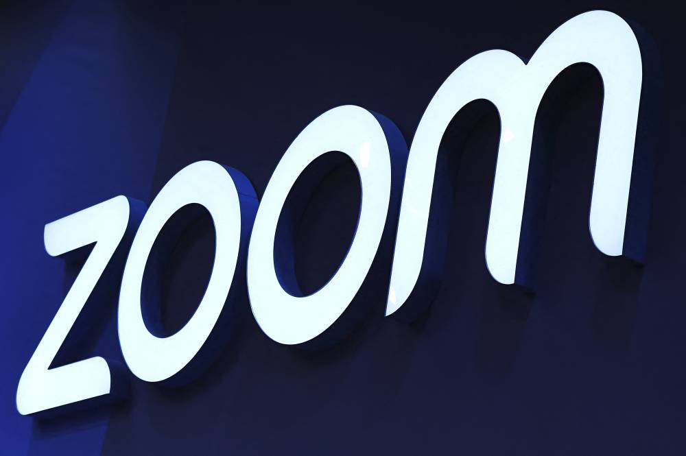 The logo of Zoom Video Communications is seen on the opening day of the Integrated Systems Europe audiovisual and systems integration exhibition in Barcelona on Jan 31, 2023. - (Photo by PAU BARRENA / AFP)