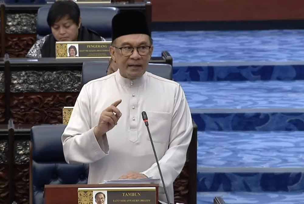 Anwar during the presentation of the Malaysia Madani Budget 2025 in the Dewan Rakyat on Friday.