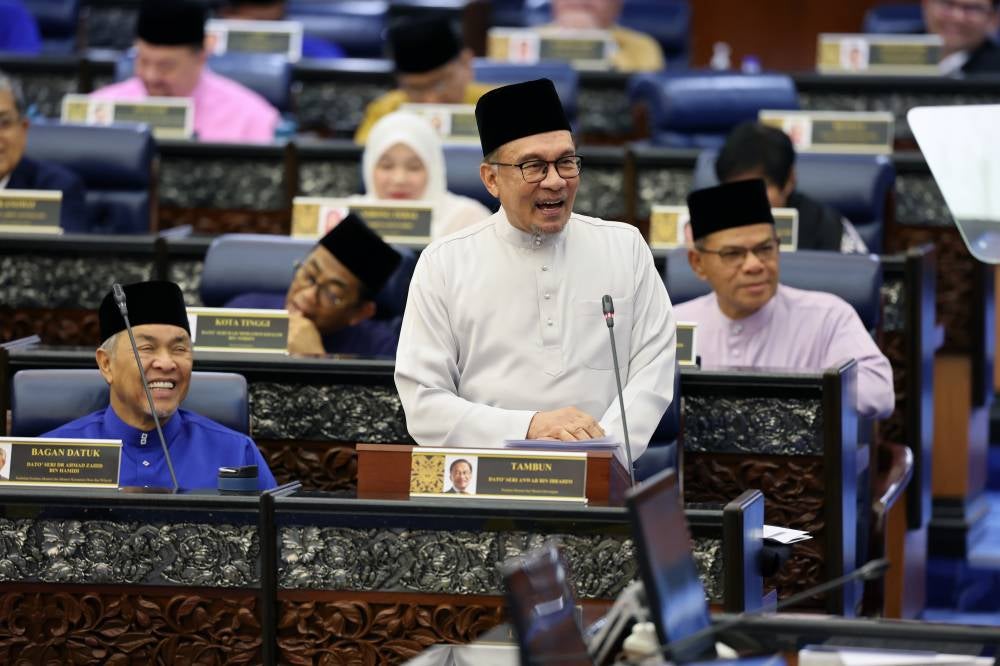 Anwar Ibrahim tabling the 2025 Budget. Photo by Bernama
