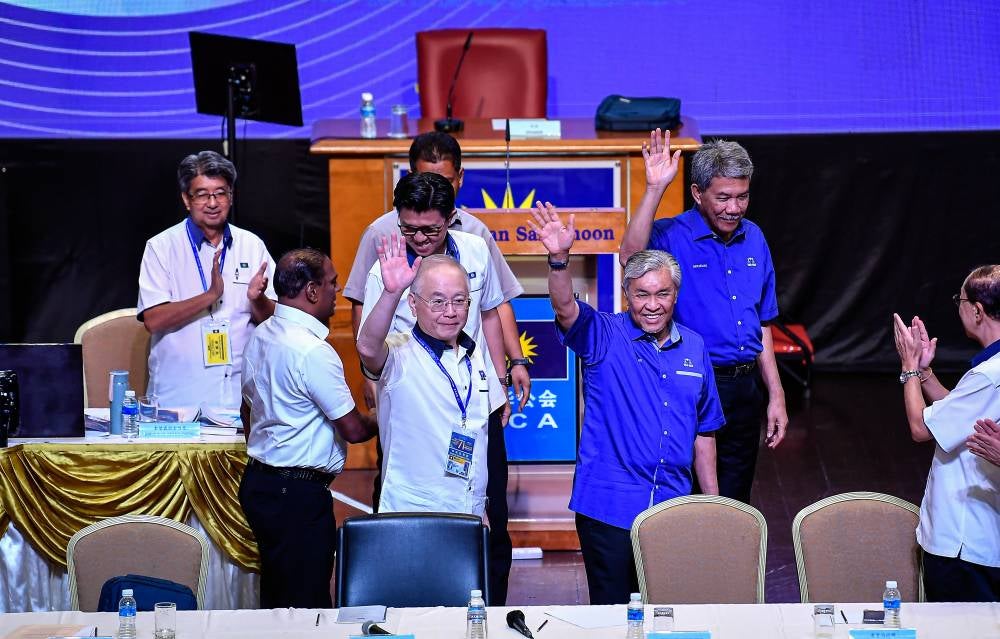 Zahid (right) and Wee at MCA’s 71st annual general assembly here yesterday. Photo by Bernama