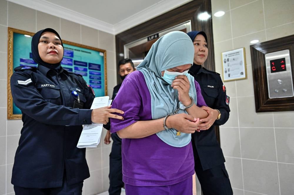 Businesswoman, Nooraini Remali, 36, pleaded not guilty in the High Court today to the charge of murdering her business partner in November last year. - Photo by Bernama