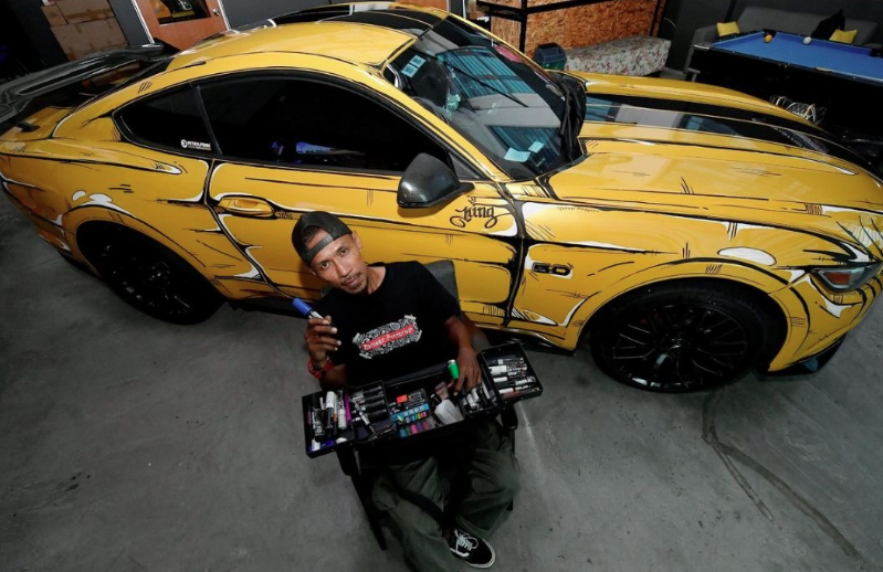 Mohd Rozamil, who also has 19 years of experience painting with the airbrush technique, said he has done "paintings” on over 30 vehicles, including trucks, multipurpose vehicles, motorcycles and heavy machinery such as excavators. - Photo by Bernama