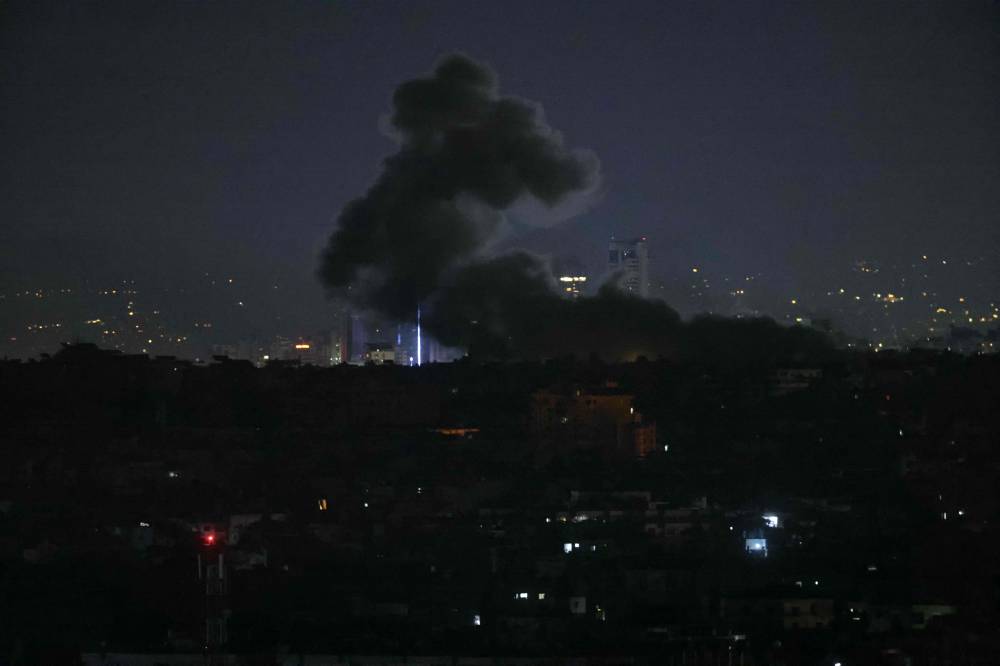 Smoke rises from the site of an Israeli airstrike that targeted a neighbourhood in Beirut. Photo by Ibrahim Amro/AFP