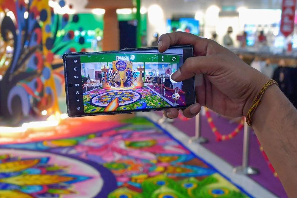 Sales of kolam rice usually spike up to tenfold in the days leading up to Deepavali, compared with regular days. - Photo by Bernama