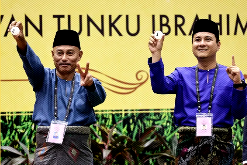 (from left to right) Barisan Nasional candidate Syed Hussien Syed Abdullah and Perikatan Nasional candidate Mohamad Haizan Jaafar during the nomination day for the Mahkota state by-election, at the nomination centre in Dewan Tunku Ibrahim Ismail, Kluang, Johor, on Sept 14, 2024. (Picture by BERNAMA)