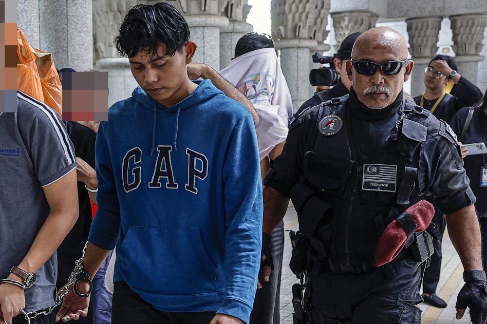 Muhammad Wan Azhar Azman, 20, was charged with stealing a car and dangerously driving the rented vehicle resulting in a man being seriously injured. - Photo by Bernama