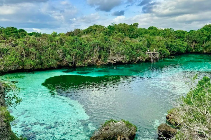 Weekuri Lake was naturally formed by waves from the Indian Ocean crashing against the coral rock cliffs. - Photo by Bernama